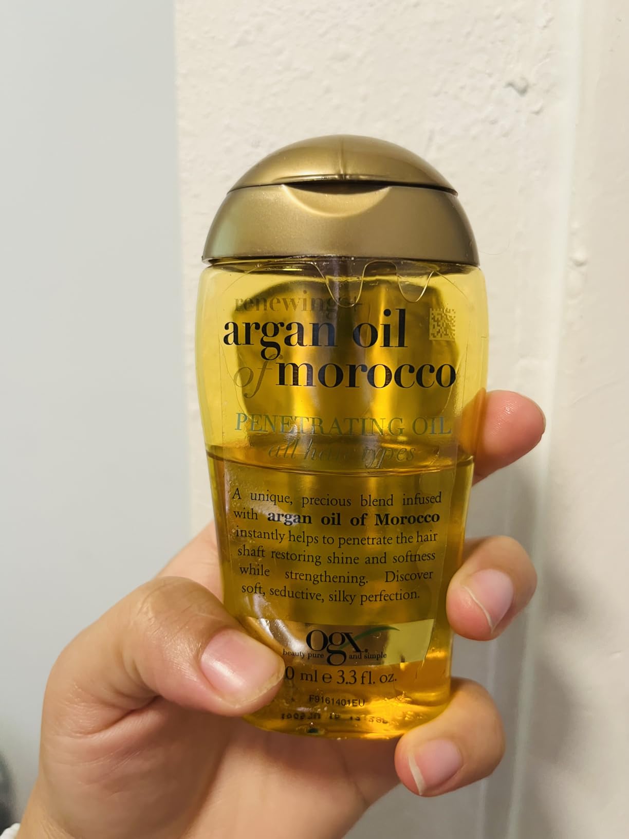 OGX Renewing + Argan Oil of Morocco, Cold-Pressed Argan Oil for Hair Penetrating Treatment & Shine, Moisturizing & Strengthening Silky Oil for All Hair Types, Paraben & Sulfate Free, 3.3 fl oz customer photo 2