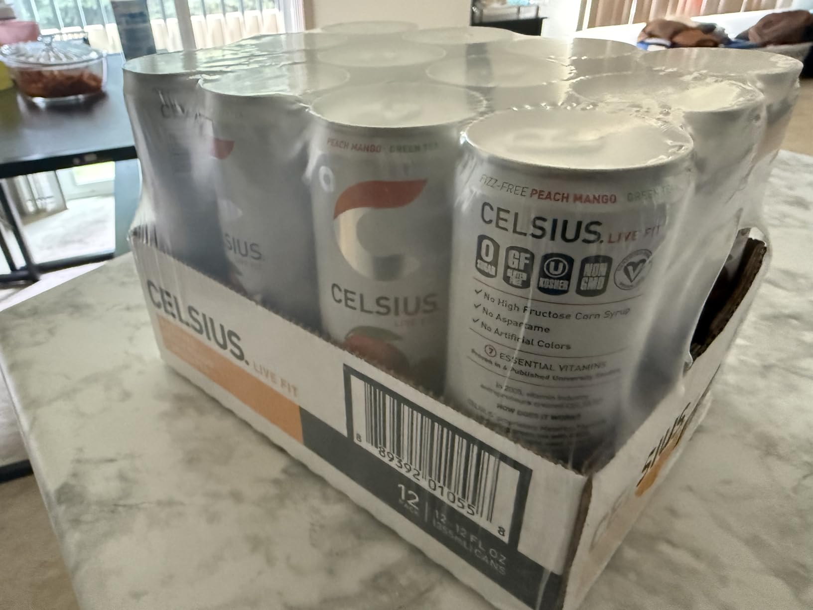 CELSIUS Fizz Free Peach Mango Green Tea, Sugar Free Energy Drink, 12 Fl Oz (Pack of 12) customer photo 2