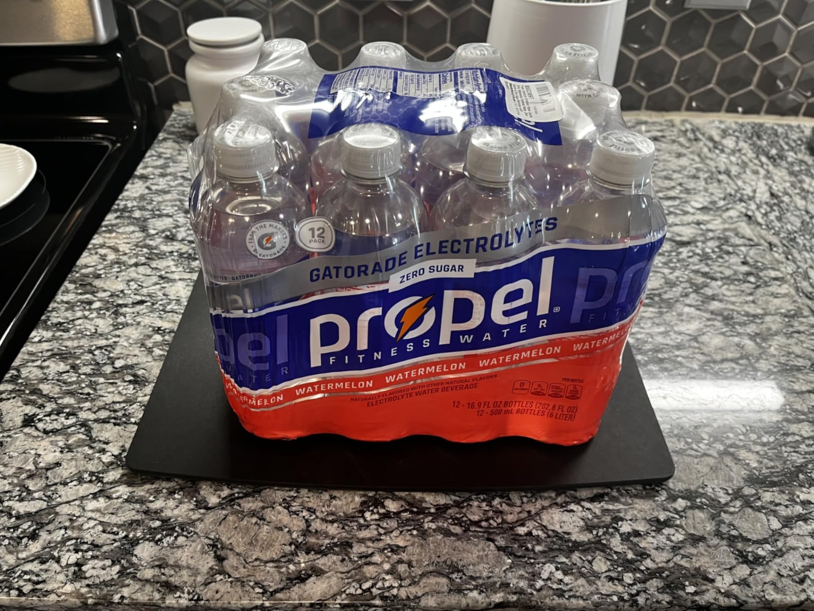 Propel Electrolyte Enhanced Water Sports Drink, Watermelon Flavored Water, Zero Calorie & Zero Sugar Hydration with Electrolytes and Vitamins C & E, 16.9 fl oz Water Bottles (12 Pack) customer photo 2