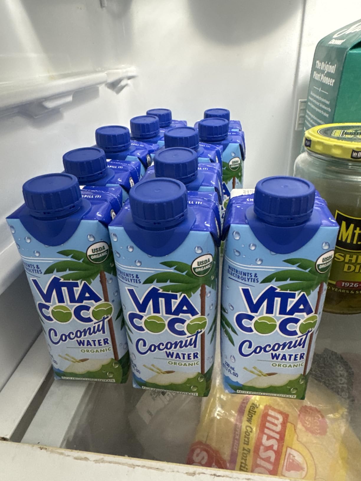 Vita Coco Coconut Water, Pure Organic | Refreshing Coconut Taste | Natural Electrolytes | Vital Nutrients | 11.1 Oz (Pack Of 12) customer photo 1