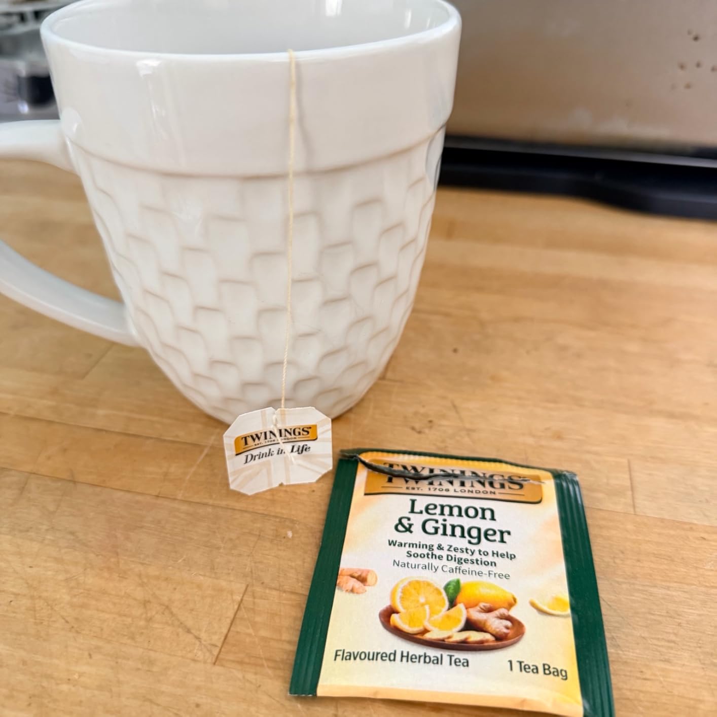 Twinings Lemon & Ginger Herbal Tea Individually Wrapped Bags, 100 Count (Pack of 1), Tangy Lemon, Spicy Ginger, Naturally Caffeine-Free, Enjoy Hot or Iced, 100 Teabags customer photo 1
