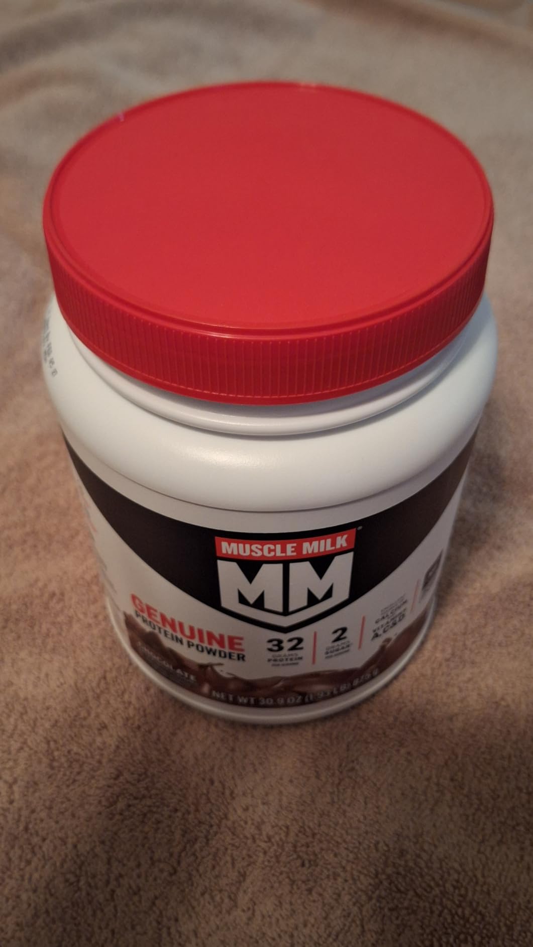 Muscle Milk Genuine Protein Powder, Chocolate, 1.93 Pounds, 13 Servings, 32g Protein, 2g Sugar, Calcium, Vitamins A, C & D, NSF Certified for Sport, Energizing Snack, Packaging May Vary customer photo 1