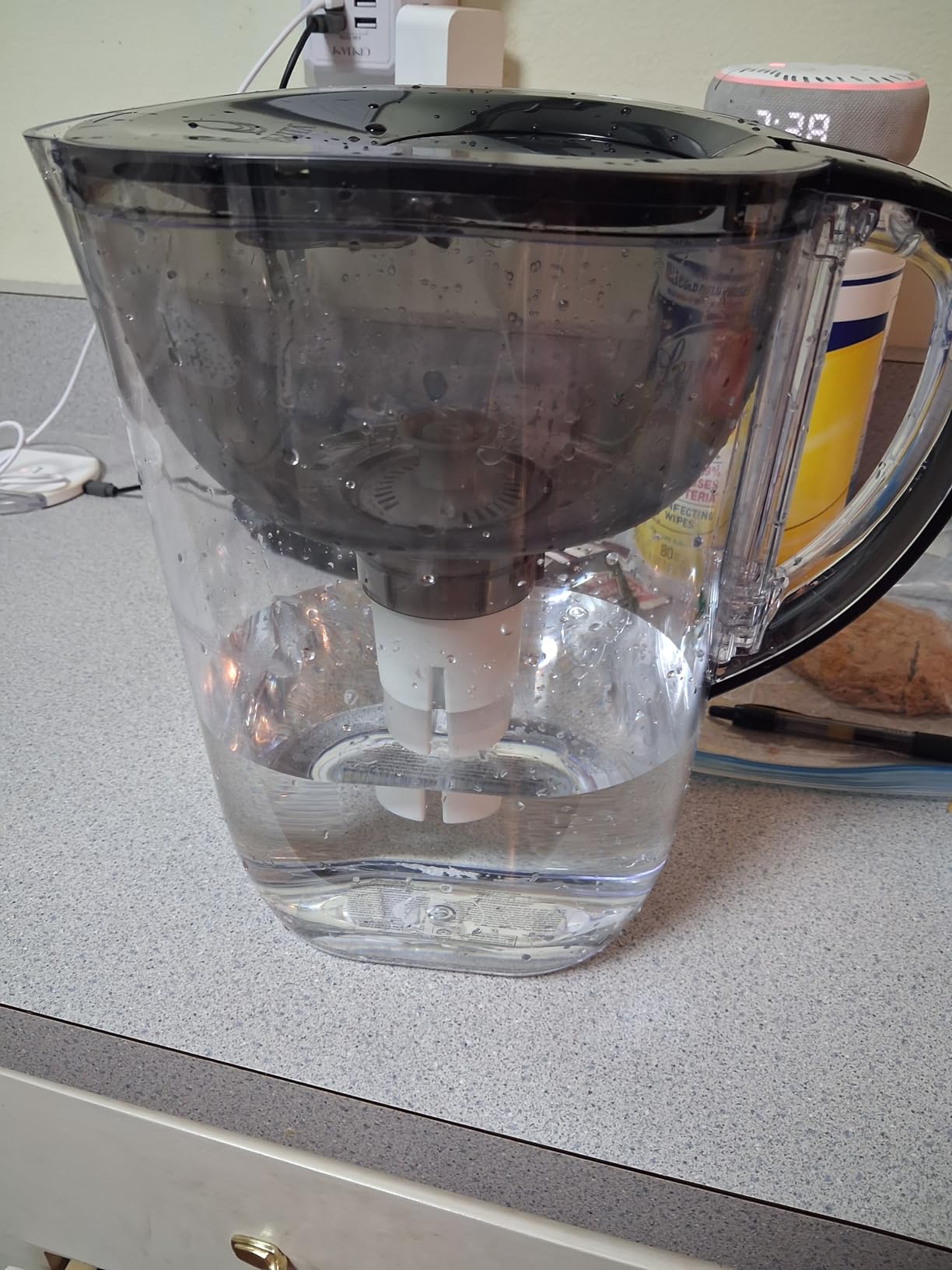 Brita Large 10-Cup Water Filter Pitcher with BritaPlus Filter, WQA NSF/ANSI Certified, Reduces 2X Contaminants vs. Standard, Removes Chlorine Taste & Odor, Reduces Zinc Copper Mercury & More, Black customer photo 2