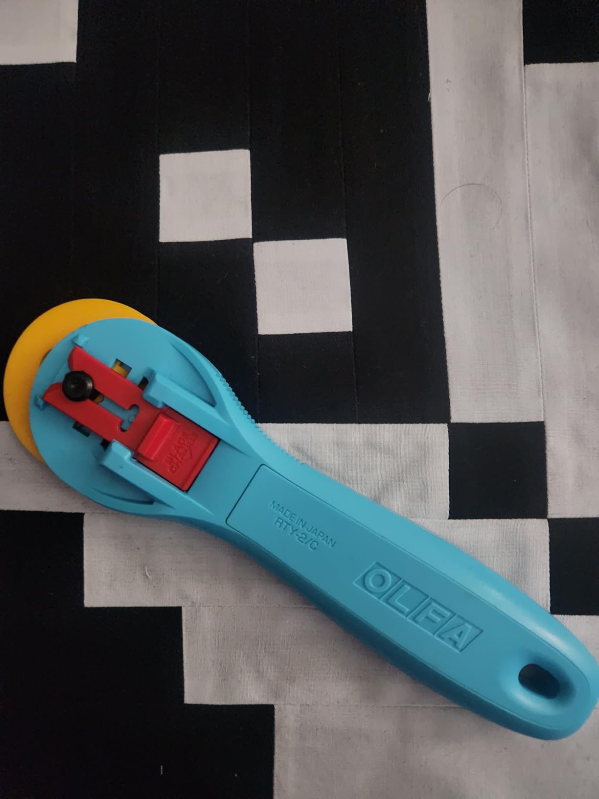 OLFA 45mm Quick-Change Rotary Cutter (RTY-2/C) - Tungsten Blade, Aqua | 45mm Quick Change Rotary Cutter, Integrated finger groove, Easy-slide blade cover, Right & Left Hand - Quilters and Crafters customer photo 1