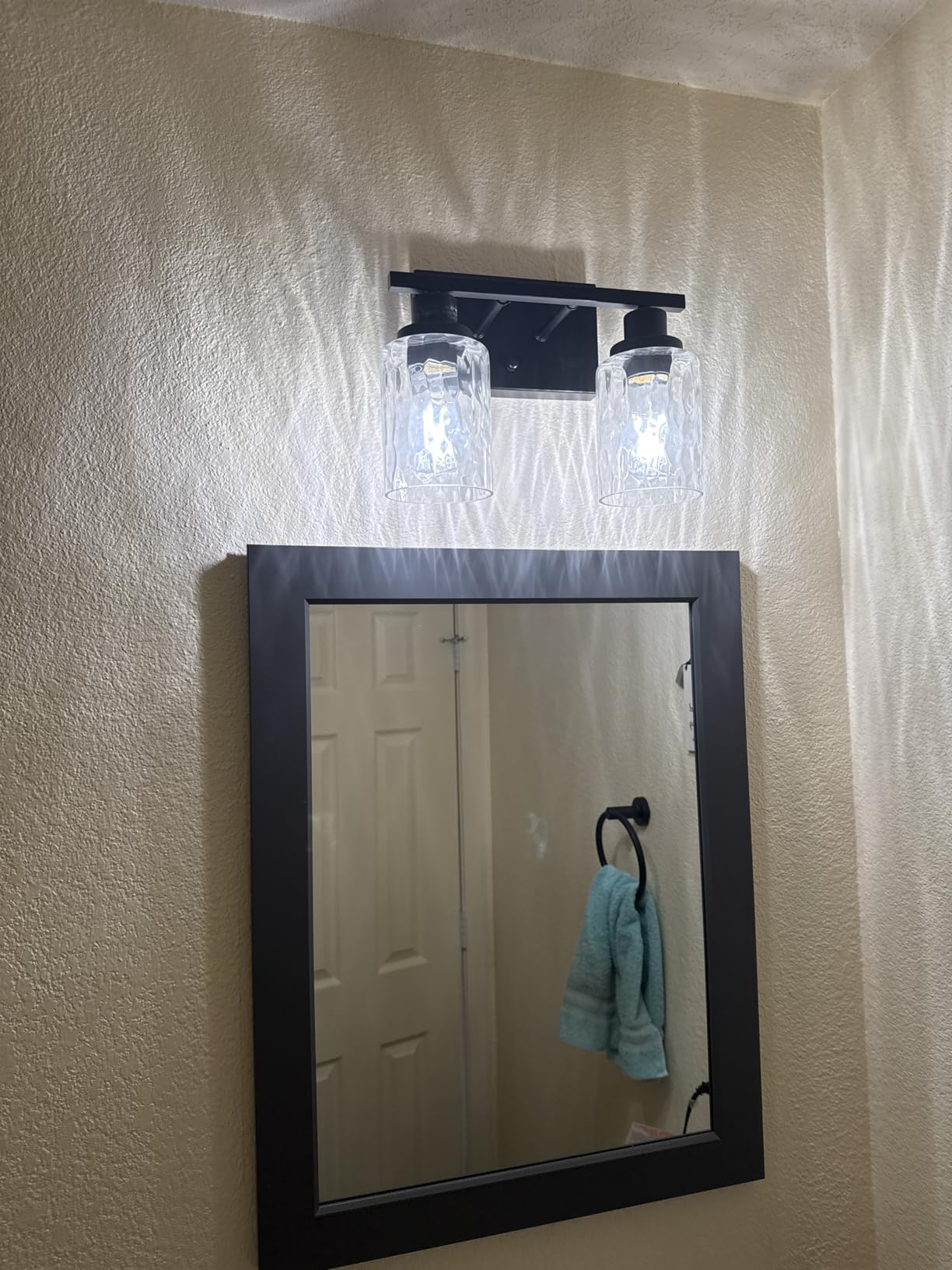 MELUCEE Brushed Nickel Bathroom Vanity Light with Clear Hammered Glass | 4-Light Wall Light Fixtures Modern Wall Lamp for Powder Room Bedroom Porch (Patent No.: US D963914 S) customer photo 2