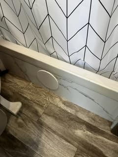 Palisade 25.6 in. x 14.8 in. Vinyl Wall Tiles in Carrara Marble (8 Pack) | Interlocking waterproof tiles for kitchen or bathroom customer photo 1