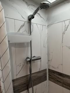 Palisade 25.6 in. x 14.8 in. Vinyl Wall Tiles in Carrara Marble (8 Pack) | Interlocking waterproof tiles for kitchen or bathroom customer photo 2