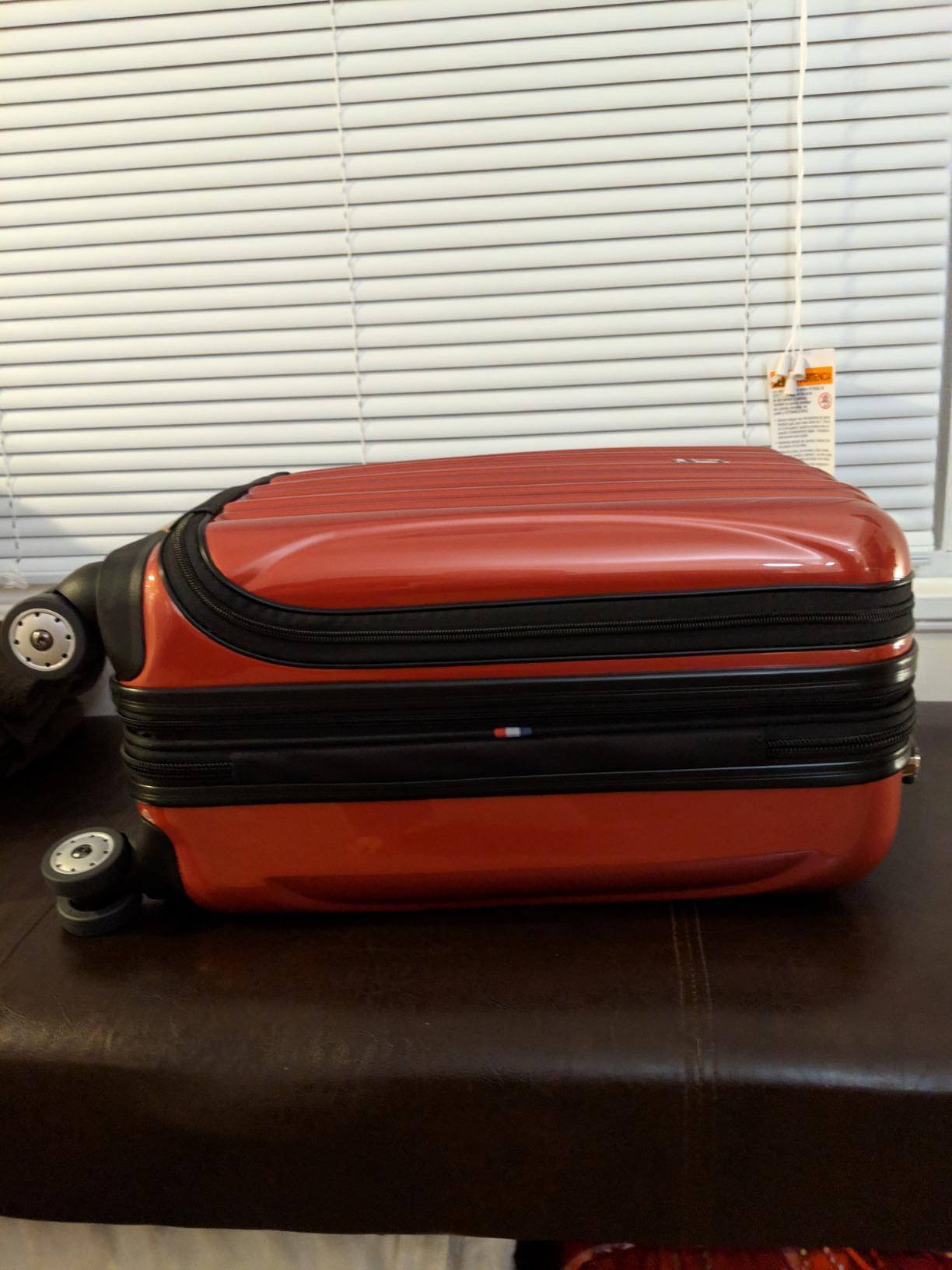DELSEY PARIS Helium Aero Hardside Expandable Luggage with Spinner Wheels, Titanium, Checked-Large 28 Inch customer photo 1
