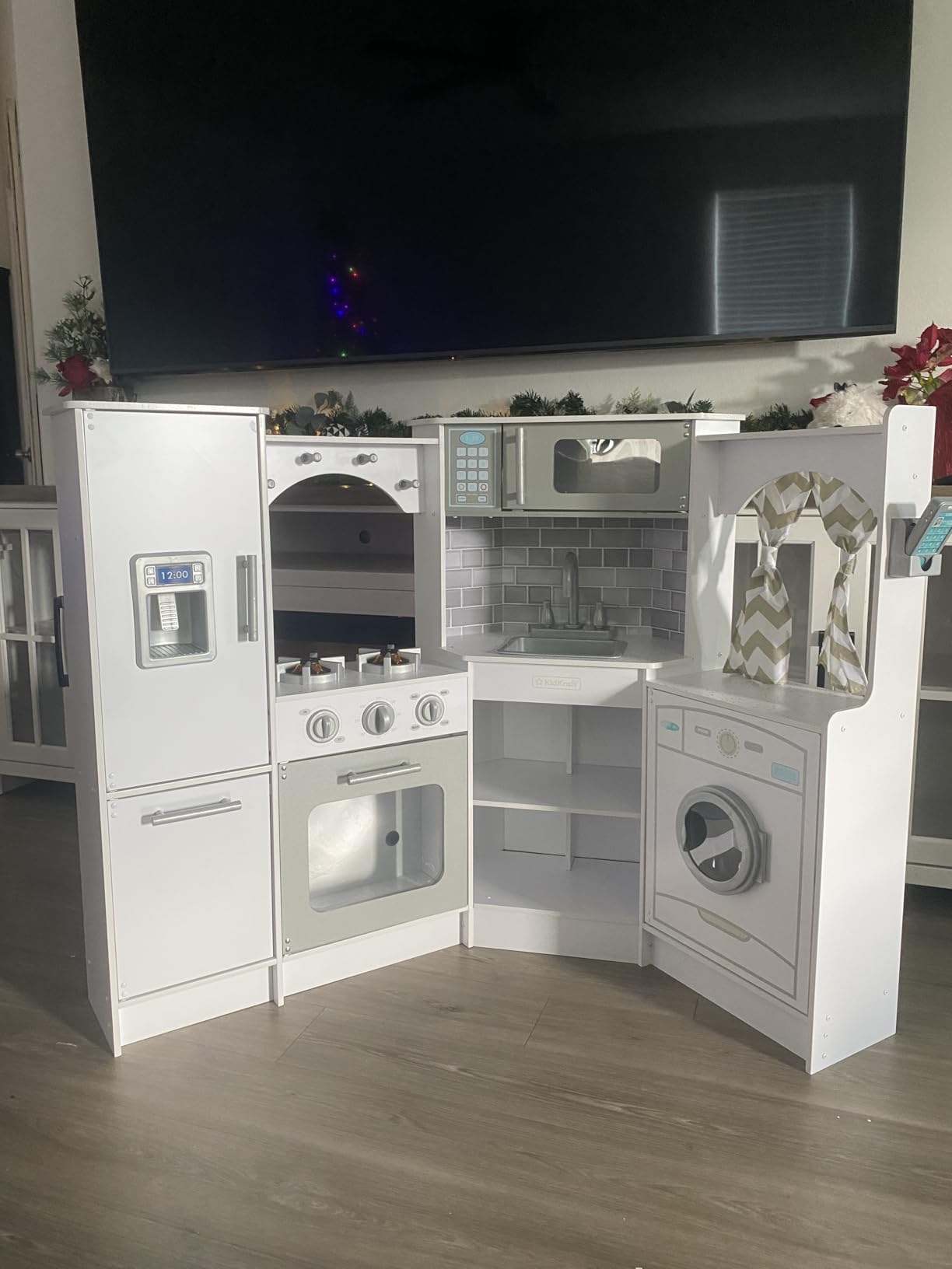 KidKraft Ultimate Corner Wooden Play Kitchen with Lights & Sounds, Play Phone and Curtains, White customer photo 1