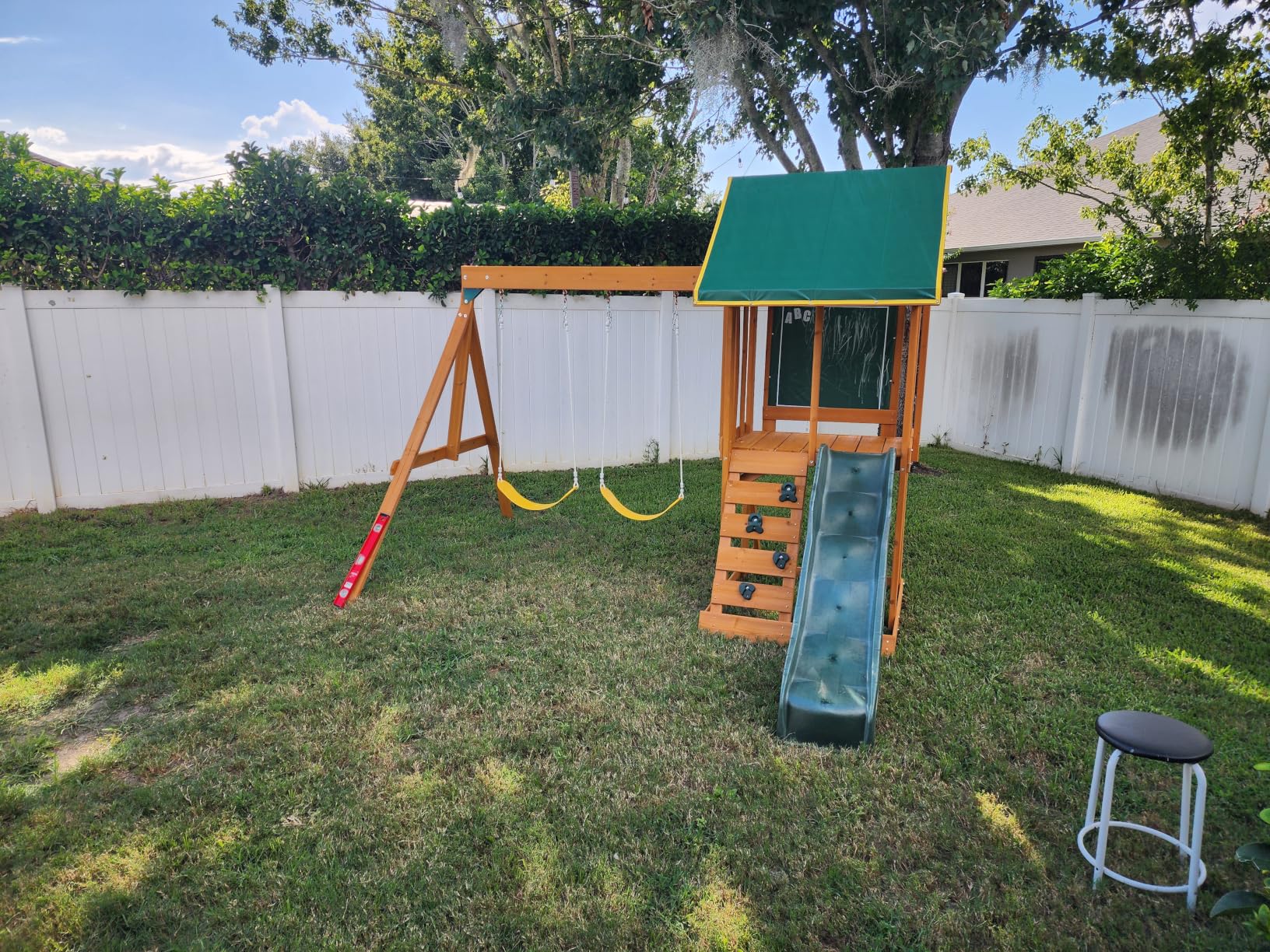 KidKraft Appleton Wooden Swing Set, (Amazon Exclusive) | Rock Wall, Wavy Slide, Vinyl Canopy, 2 Swings, Sandbox Area, For Ages 3+ customer photo 1