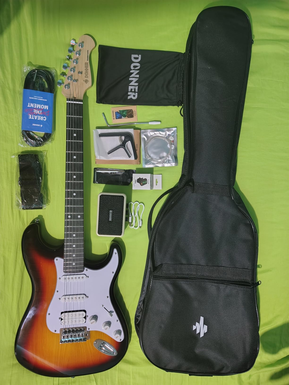 Donner DST-100S 39 Inch Full Size Electric Guitar Kit | Solid Body Sunburst, Beginner Starter, with Amplifier, Bag, Capo, Strap, String, Tuner, Cable, Picks customer photo 2