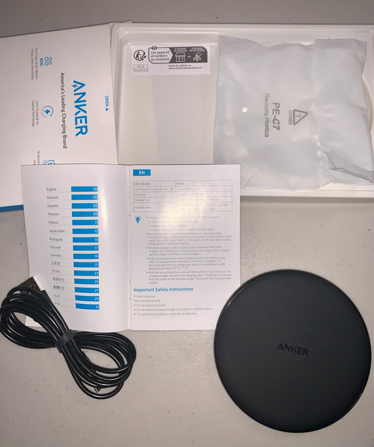 Anker 313 Qi-Certified 10W Fast Wireless Charger Pad | Portable Wireless Charging Pad for Samsung, iPhone, and AirPods (AC Adapter Not Included, Not MagSafe-Compatible) customer photo 2