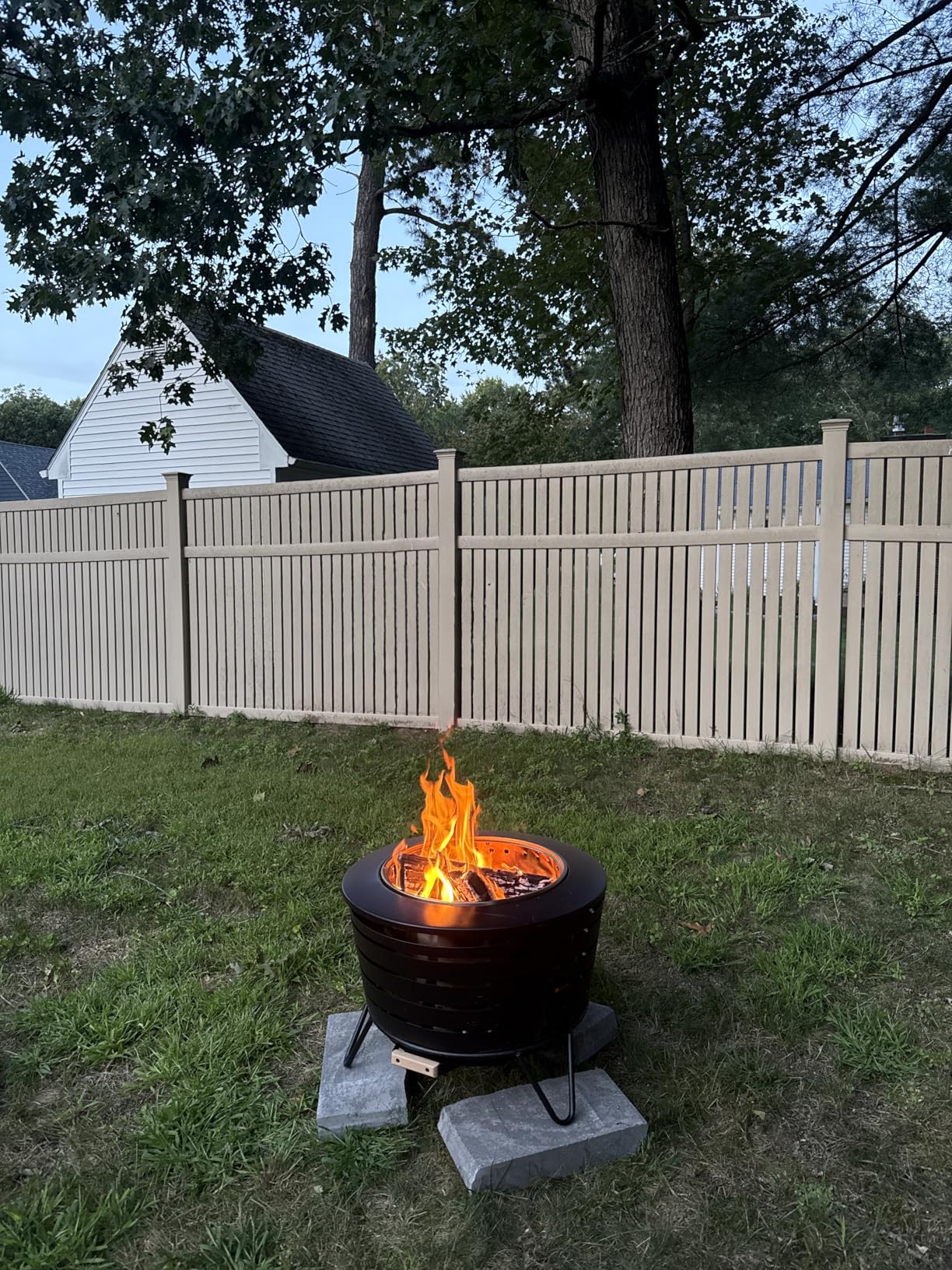TIKI Patio Smokeless Fire Pit, 25 in Wood Burning Fire Pit with Cover | Black, 25-Inch, Stainless Steel, Wood-Burning, For Backyards and Patios, Includes Cover, Removable Ash Pan, Stand Included customer photo 1