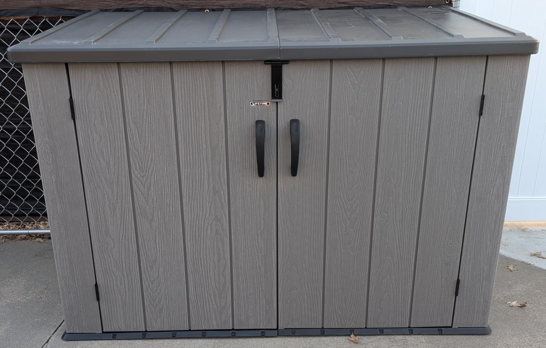 LIFETIME Horizontal Outdoor Storage Shed, Weather Resistant Resin Storage Can Fit Two Large Garbage Cans, Lockable Doors, Spring-Hinge Lid, Low-Maintenance Backyard Utility Shed customer photo 1