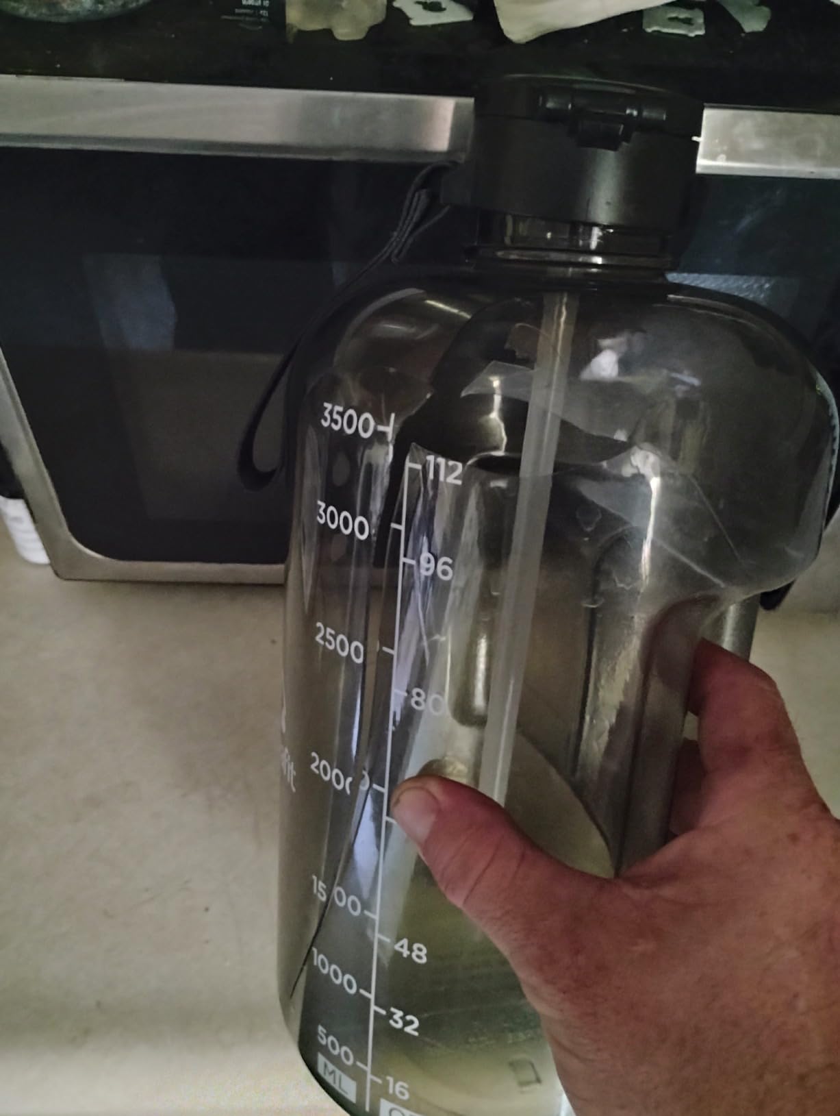 AQUAFIT 64 oz Water Bottle with Time Marker, 2in1 Lid | BPA Free Half Gallon Water Bottle with 2in1 Straw and Chug Lid - Leakproof Gym Water Bottle with Carry Handle (Gray) customer photo 2