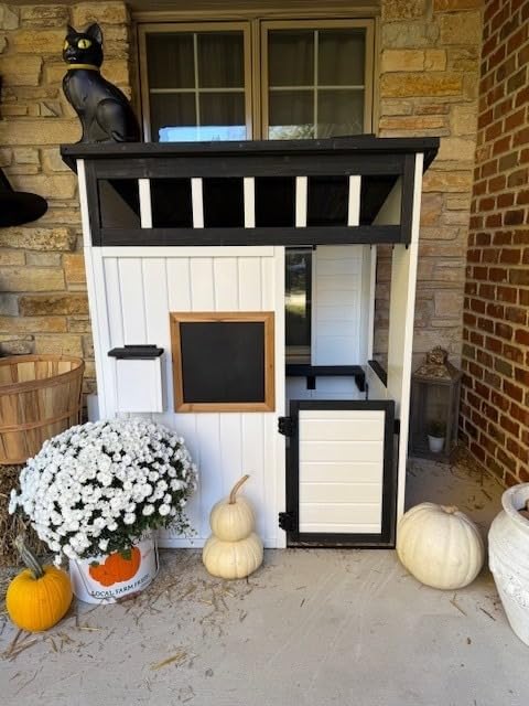 Backyard Discovery Caraway Cottage Cedar Wooden Kids Playhouse with Play Kitchen, Chalkboard, Mailbox, Half Door, Windows, Flower Box, Modern Farmhouse Design for Outdoor Imaginative Play customer photo 1