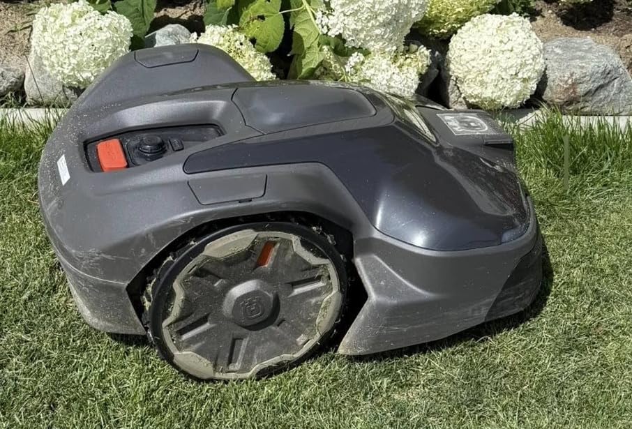 Husqvarna 410iQ ½ Acre Wire-Free, 45% Slope, app Based, Robot Lawn Mower | Wire-free robot mower with EPOS®, app-set virtual zones, handles 45% slopes, all lawns, up to ½ acre, 4-year warranty customer photo 1