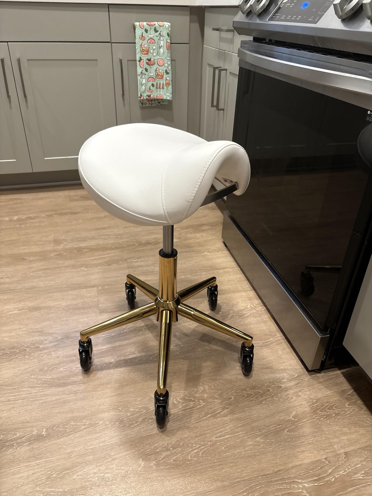 YEEZEE Saddle Stool Heavy Duty, Ergonomic Saddle Chair with Wheels, Black | Healthy Sitting Posture No Pain, Smooth Rolling No Creaky Noises, Thick PU Leather Saddle Seat, Adjustable for Salon Massage customer photo 2
