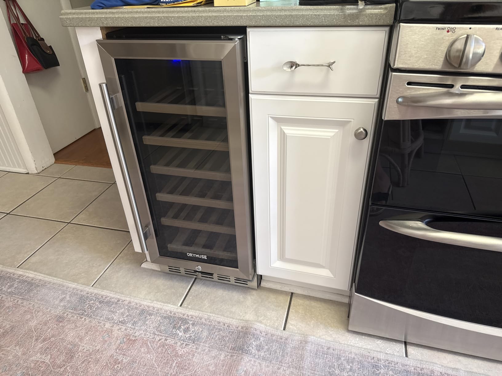 ORYMUSE 24 Inch Wine Cooler Refrigerator, 52 Bottle Dual Zone Wine Fridge with Stainless Steel Glass Door, Adjustable Shelves, Upgraded Compressor, Built-In Freestanding for Home, Bar, Kitchen customer photo 1