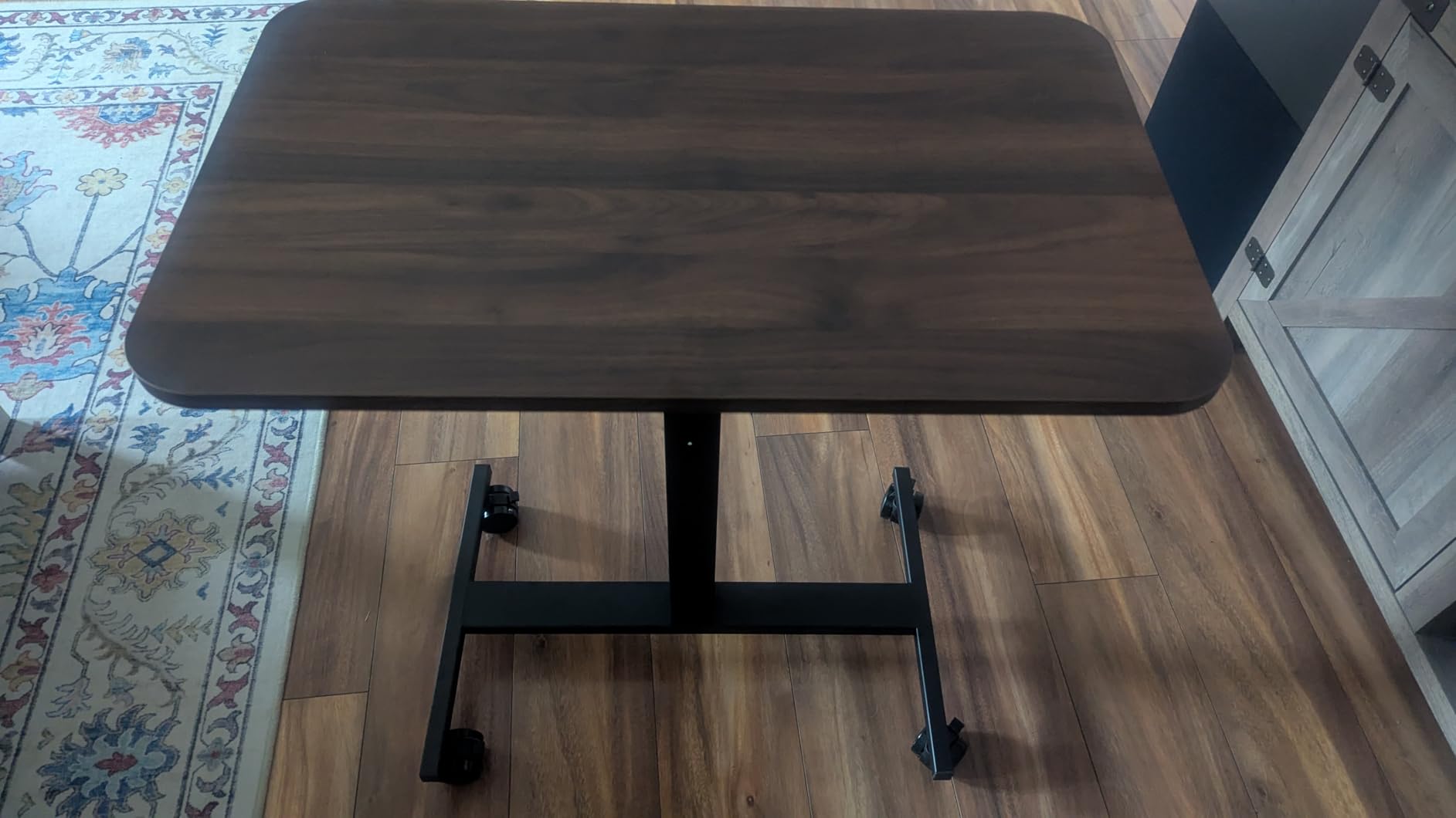 HUANUO Small Rolling Laptop Standing Desk, Height Adjustable Mobile T-Base Desk with Lockable Casters, Portable Sit-Stand Workstation for Bedside & Sofa, Walnut customer photo 2