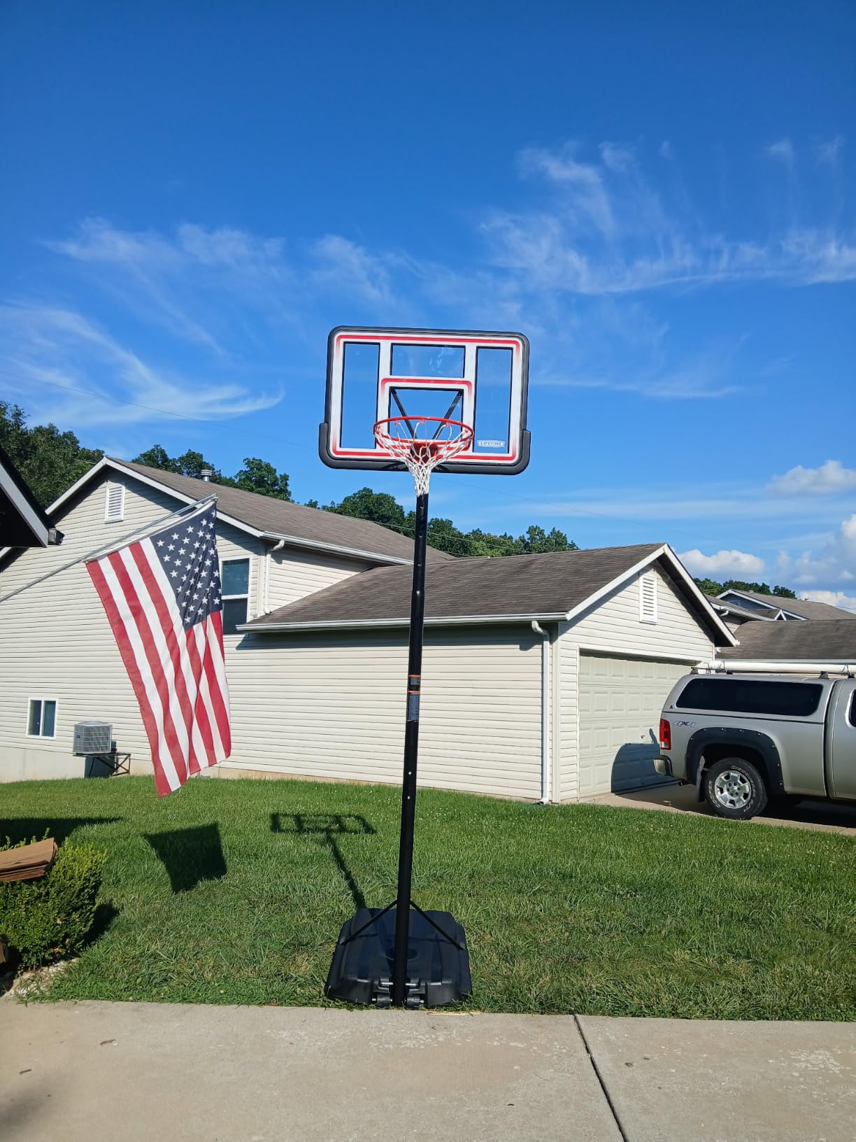 Lifetime NBA League Edition Portable Basketball Hoop, Adjustable Height 7.5-10 Ft, 44 Inch Shatterproof Polycarbonate Backboard, Steel Frame customer photo 1