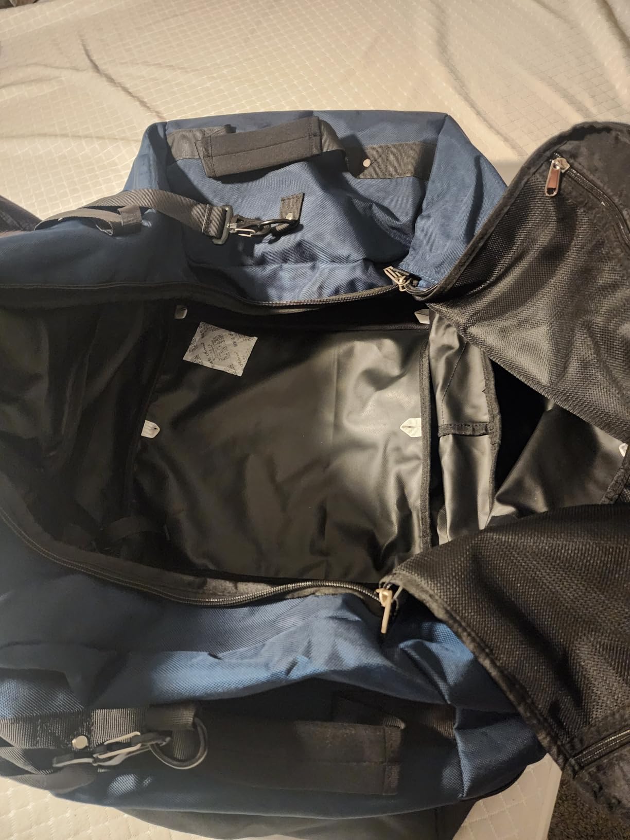 Rolling Duffle Bag with Wheels, 110L/140L Expandable Soft-Sided Foldable Duffle Bag with 2 Rubber Wheels, Packable 32 inch Rolling Carry-On with Pockets & Compartments (Dark blue) customer photo 1