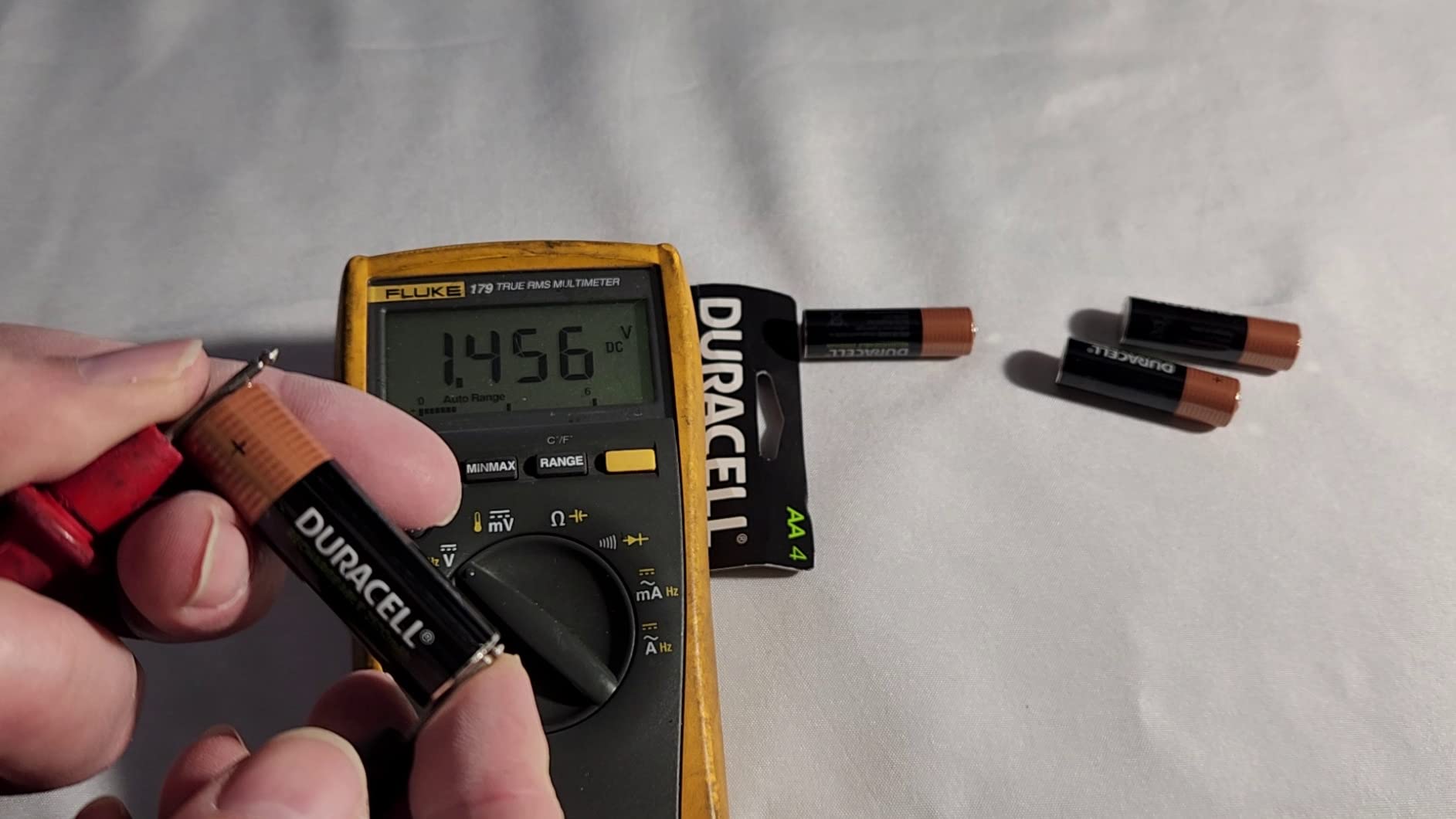 Duracell Rechargeable AA Batteries 4 Count, Long-lasting Power, All-Purpose Pre-Charged NiMH Double A Battery for Household and Gaming Devices customer photo 1