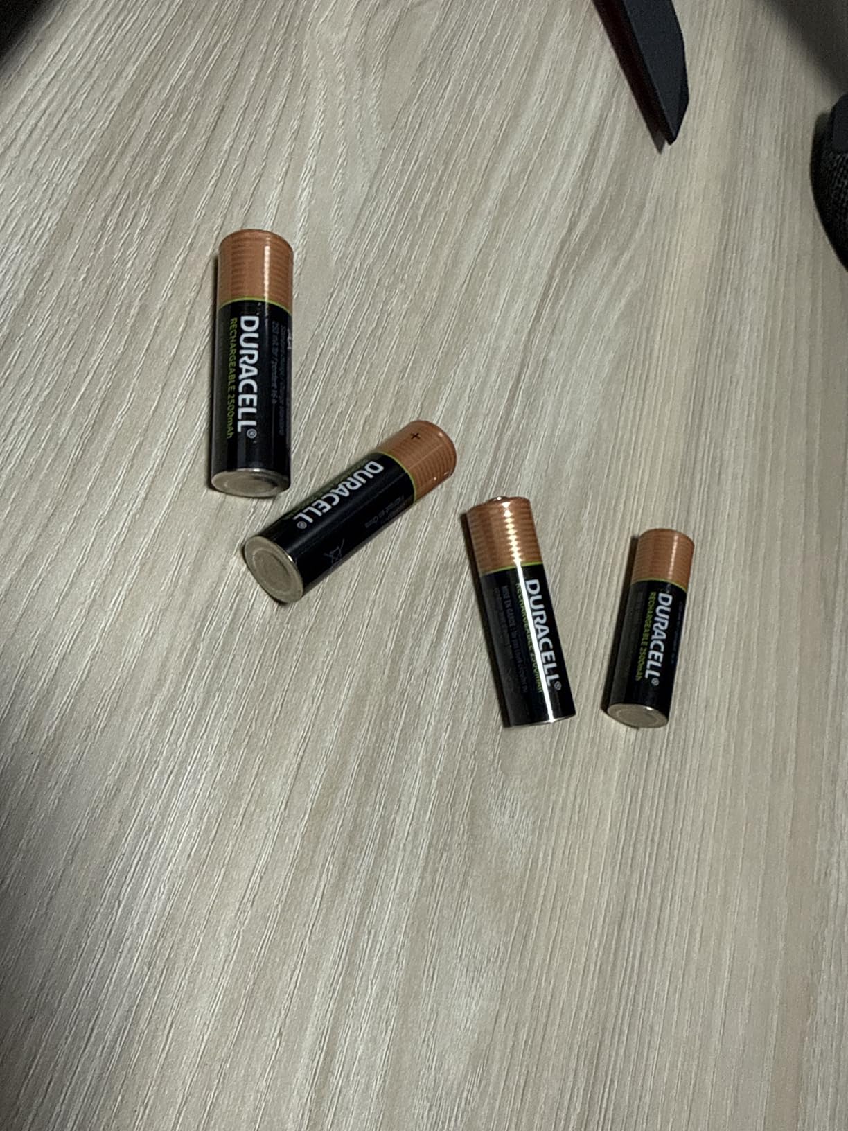 Duracell Rechargeable AA Batteries 4 Count, Long-lasting Power, All-Purpose Pre-Charged NiMH Double A Battery for Household and Gaming Devices customer photo 2