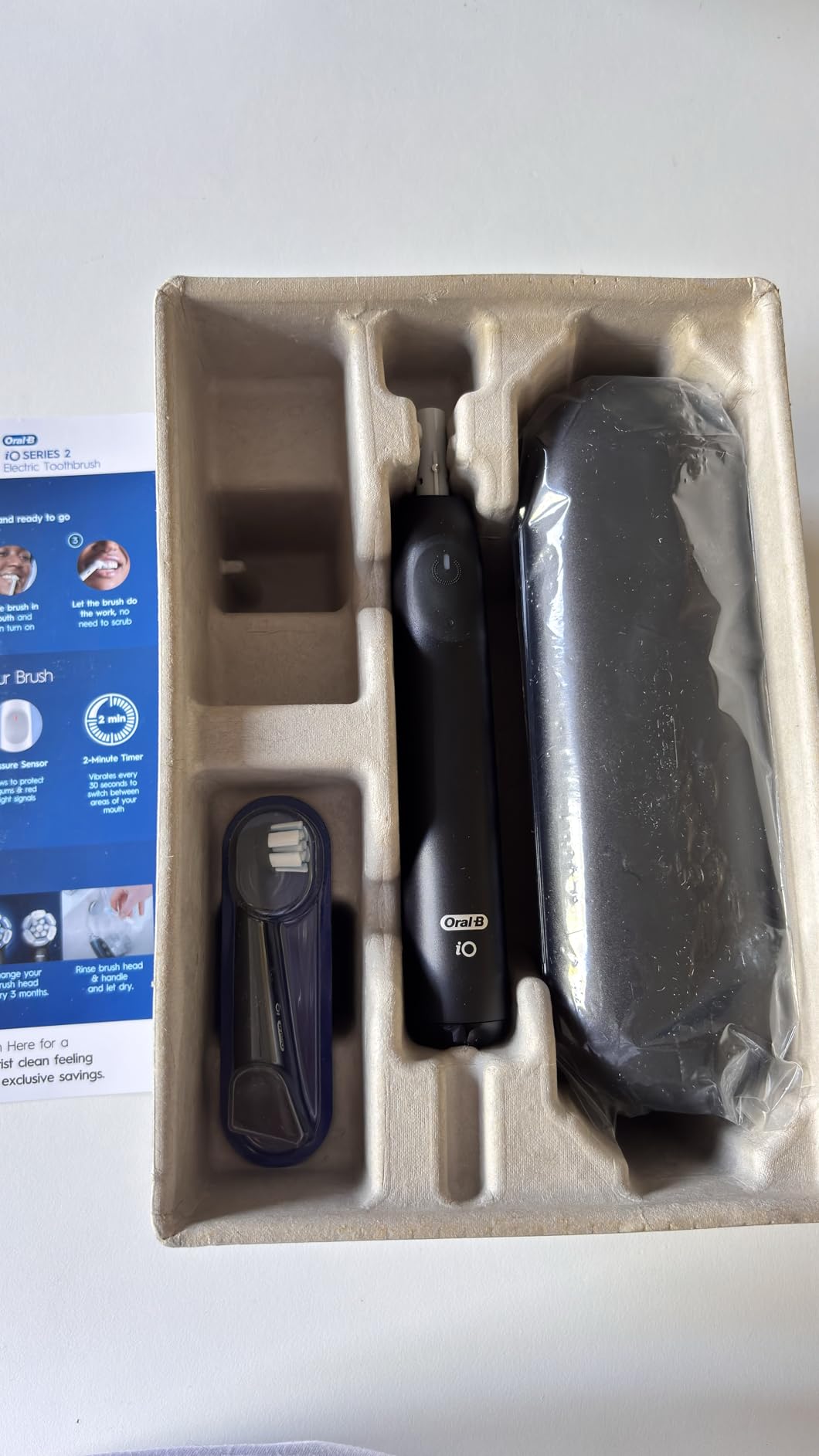 Oral-B Rechargeable Electric Toothbrush, iO Limited Simple Clean, 3 Cleaning Modes, Automatic Pressure Sensor to Protect Gums, Travel Case, White customer photo 2